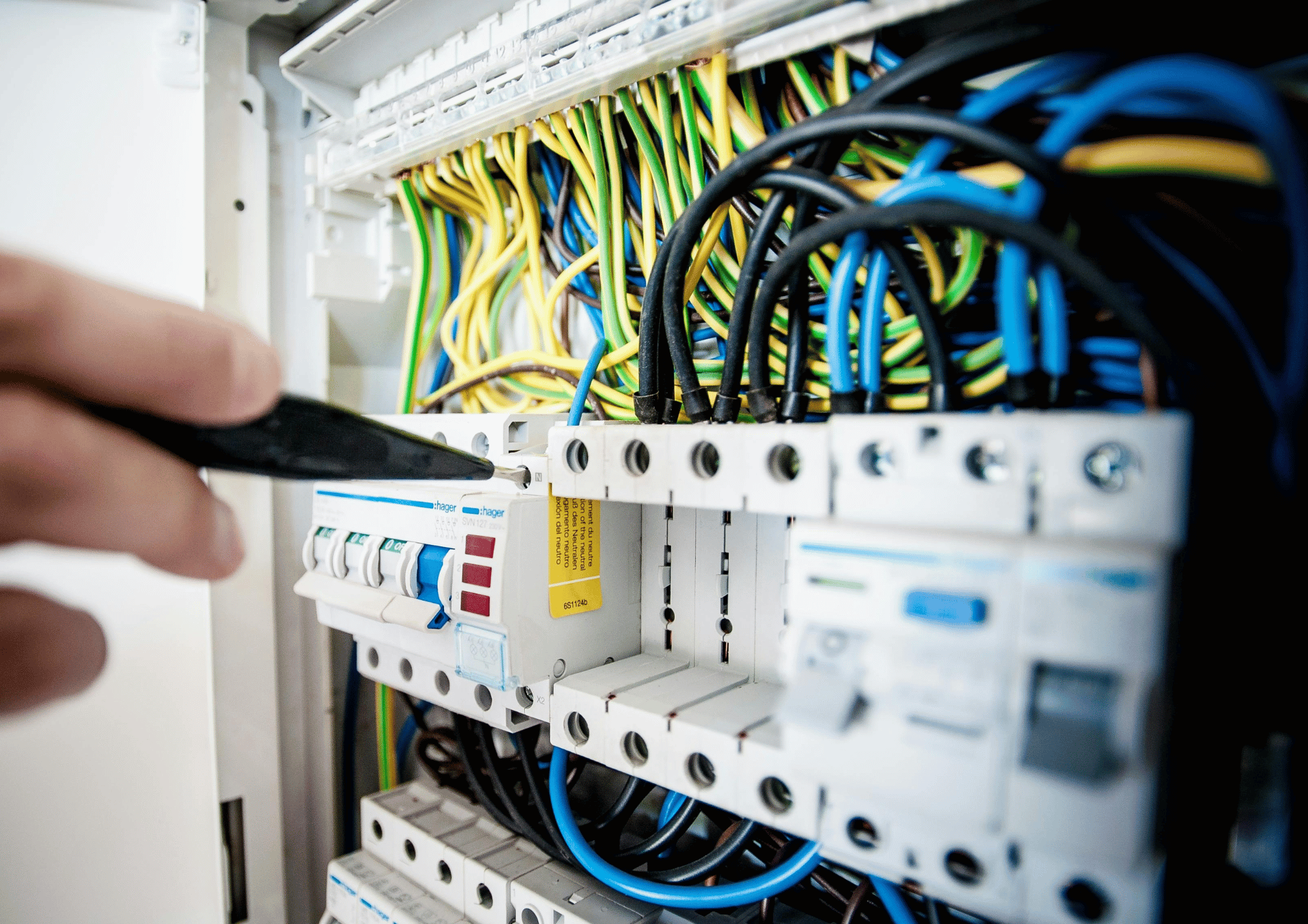Consumer unit being inspected during an EICR in Liverpool