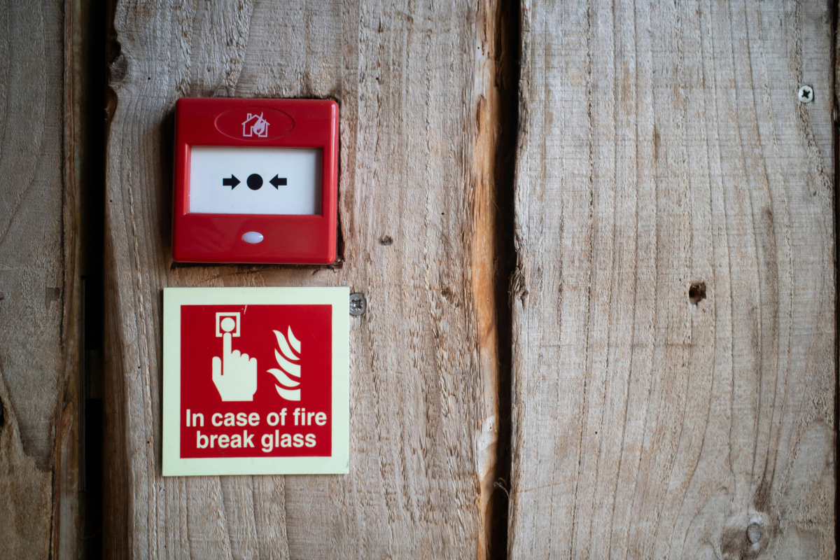 Fire alarm break glass call point tested by DH Electrical in Liverpool